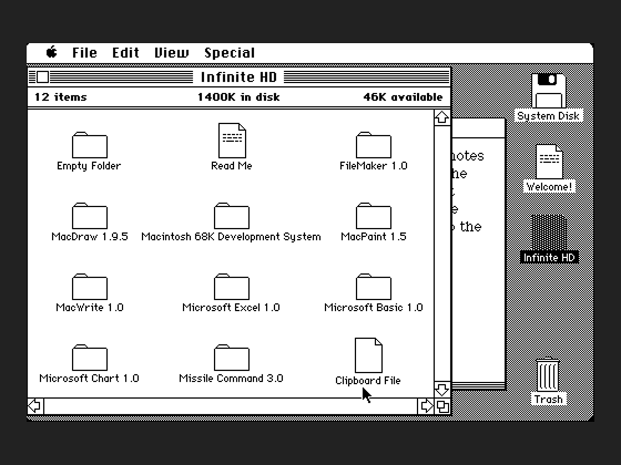The 1-bit monochrome desktop of Mac OS 1.0 with several overlapping windows.